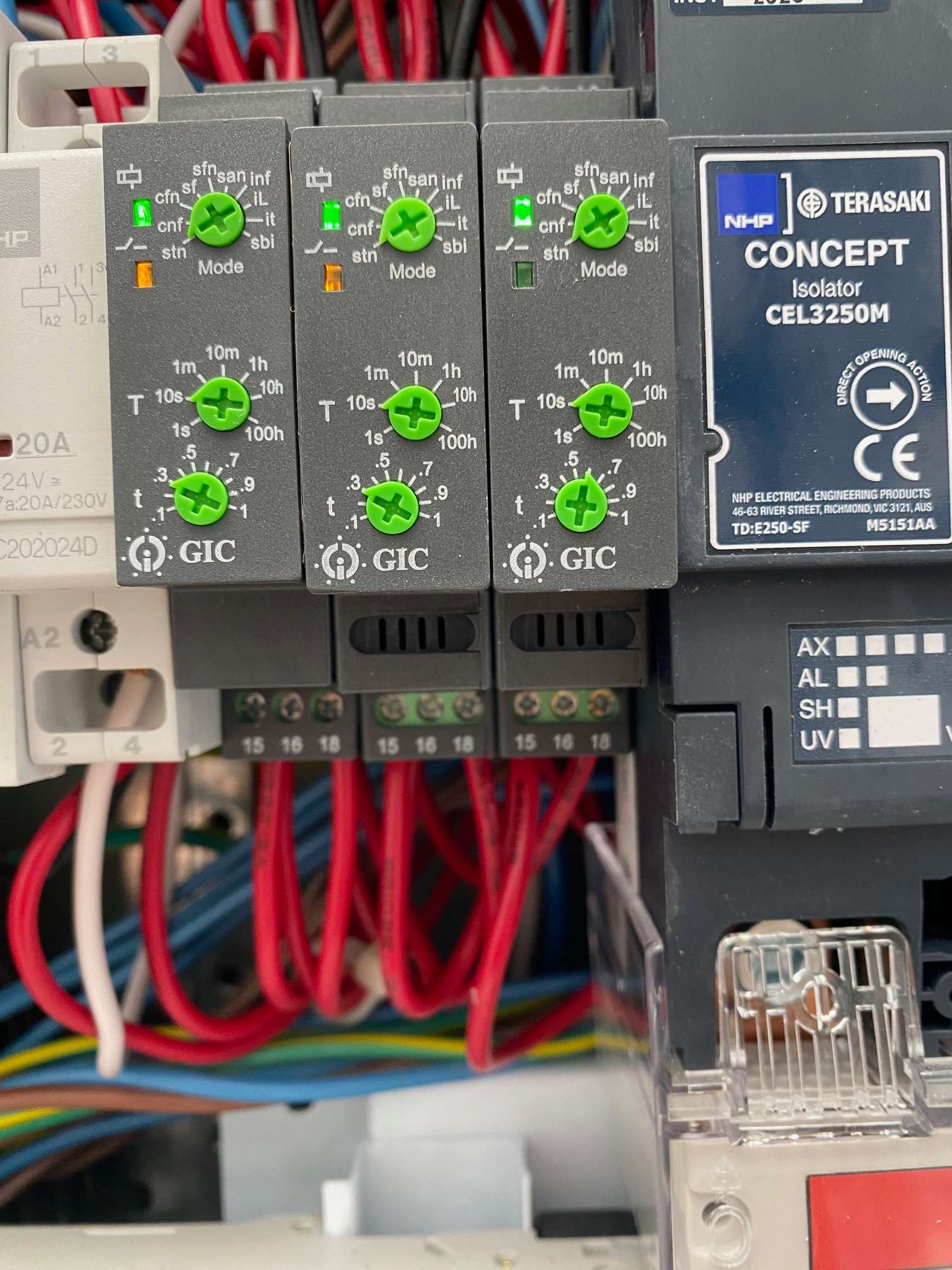 Close-up of GIC timer relays and an NHP Terasaki isolator in a switchboard